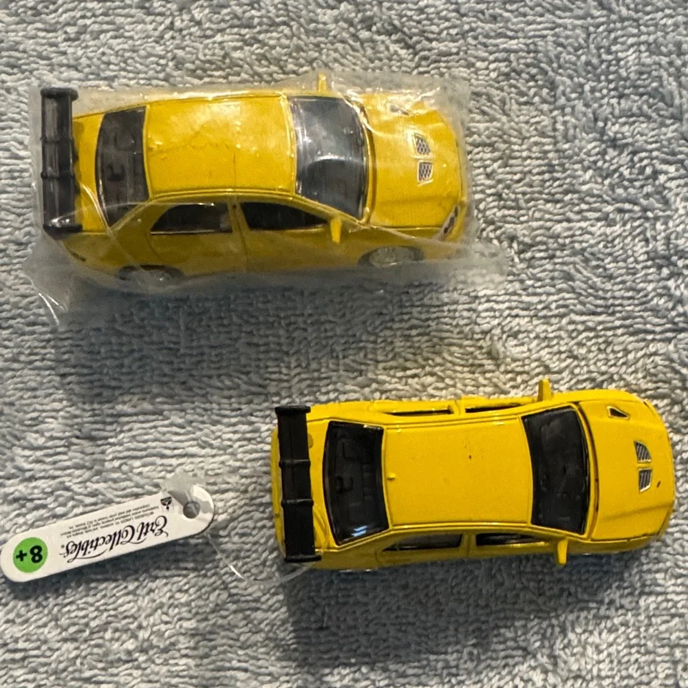 NWT ERTL Collectibles 2002 Mitsubishi Lancer Evolution Die Cast Model set of 2